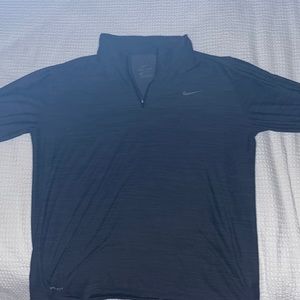 Dark grey Nike pull over